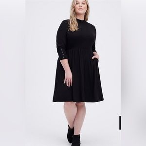 3/4 length sleeve black dress.